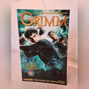 Grimm Volume 1: The Coins of Zakynthos, Paperback, New with Dented Cover See Pic